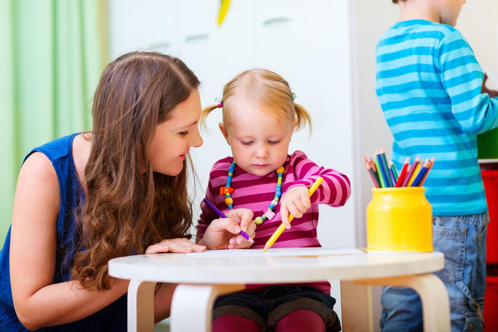 Child Care Costs More Than College in Most of U.S.