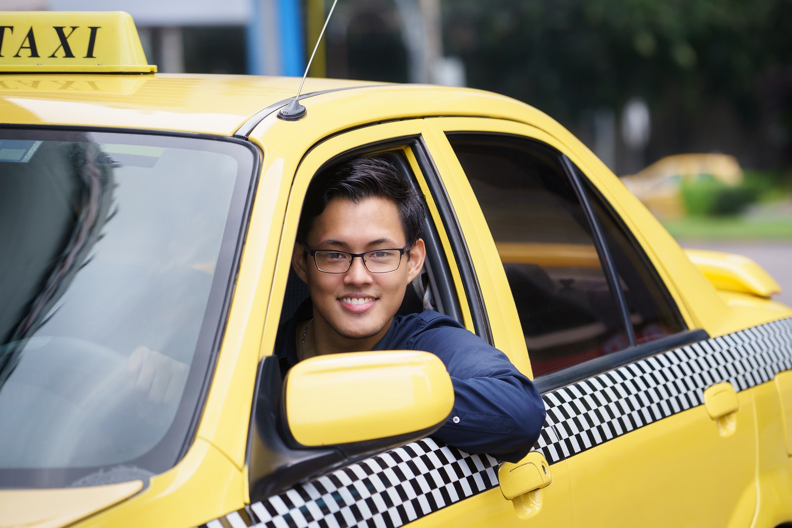 Bigstock Portrait Taxi Driver Smile Car 71892247 min Business bigstock-portrait-taxi-driver-smile-car-71892247-min-business